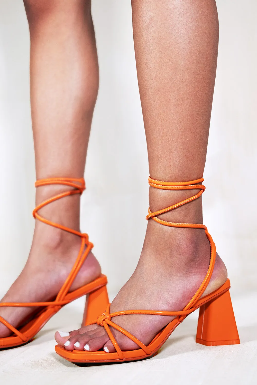 GIAVANNA STRAPPY SQUARE TOE BLOCK HEELS IN TANGERINE ORANGE FAUX LEATHER